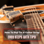 how to put on a guitar strap - featured